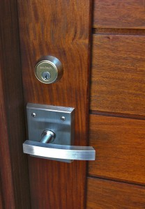 The Contemporary Alta Stainless Steel Gate Latch with round deadbolt on Gate built by Mike Bless at Lido Gates in Huntington Beach